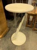 Circular stone top display table