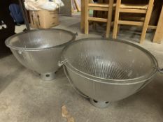 Four holophane style industrial light shades