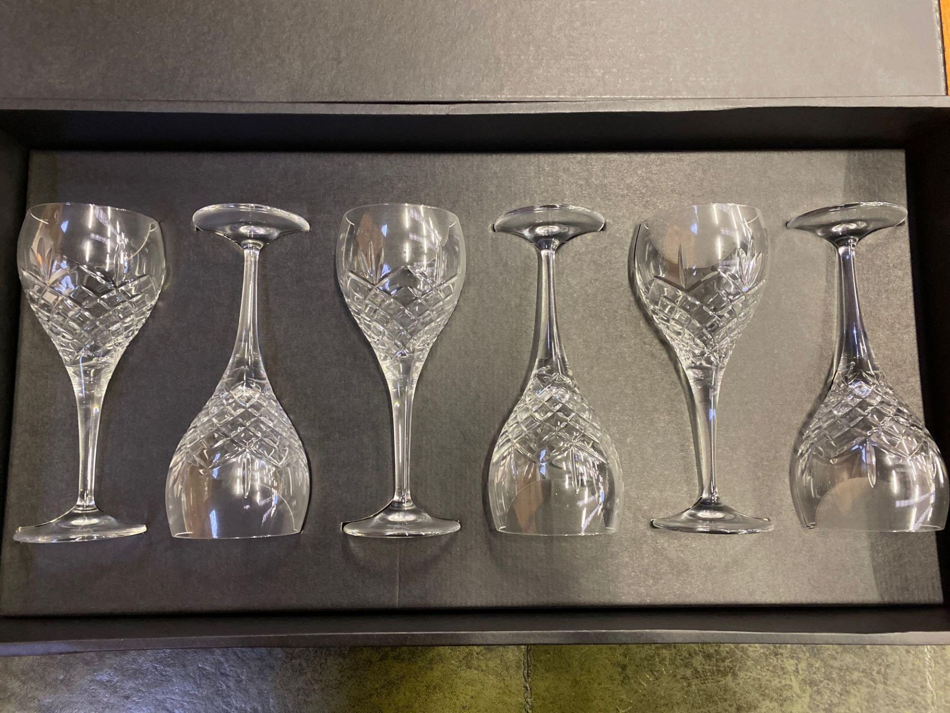 A box containing six Gleneagles of Edinburgh crystal wine glasses