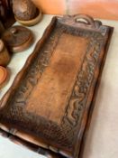 Three carved wood Oriental serving trays