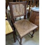 Oak framed cane chair and an upholstered tub chair