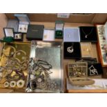A collection of silver jewellery and medals
