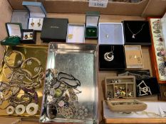 A collection of silver jewellery and medals