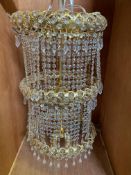 Brass effect and crystal 3 tier chandelier
