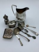 A Victorian silver jug, a Scottish Georgian silver sugar sifter and other silver items