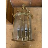 A brass and bevelled glass hall lantern