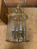 A brass and bevelled glass hall lantern