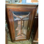 Mahogany bevelled glass fronted wall mounted corner cabinet