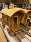 Two wooden model gypsy caravans and a model Shire horse