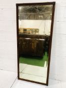 Carved mahogany framed bevelled edge wall mirror