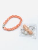 Coral twisted bracelet and a pair of coral and synthetic pearl drop earrings