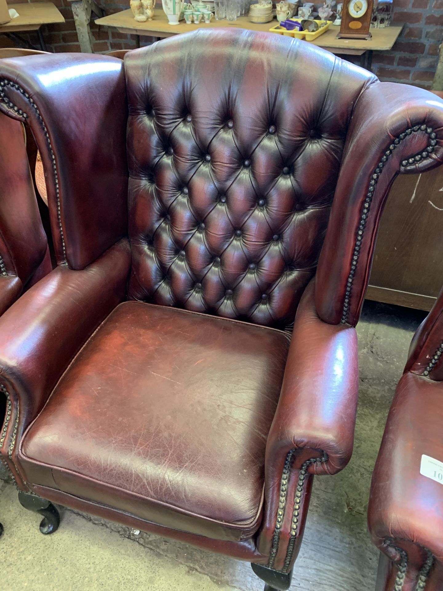 Red button leather-effect wing back armchair - Image 2 of 9