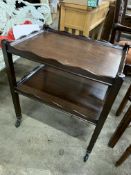 Mahogany two tier galleried trolley; mahogany occasional table; mahogany tambour fronted cabinet