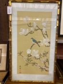 Two framed and glazed hand painted scenes of birds and blossom on silk