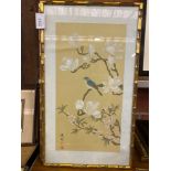 Two framed and glazed hand painted scenes of birds and blossom on silk