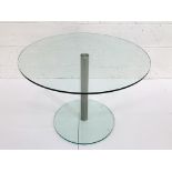 Circular glass top table