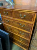 A reproduction chest of 2 over 4 drawers on bracket feet