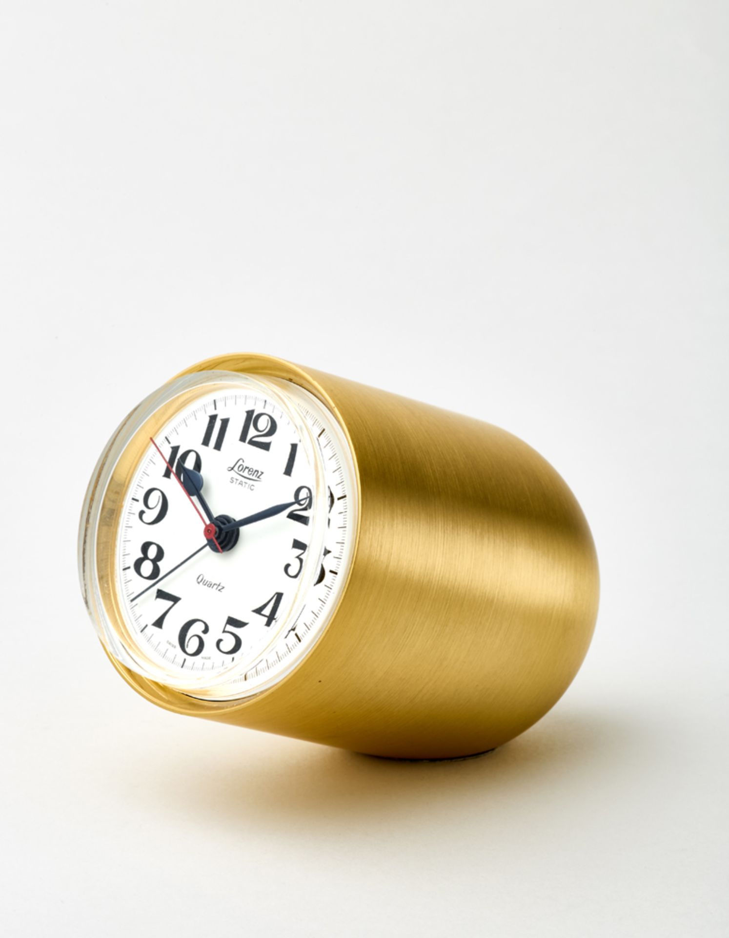 LORENTZ"Static" table clock.1980'sWhite dial with Arabic numerals.Quartz movement.Leather case (