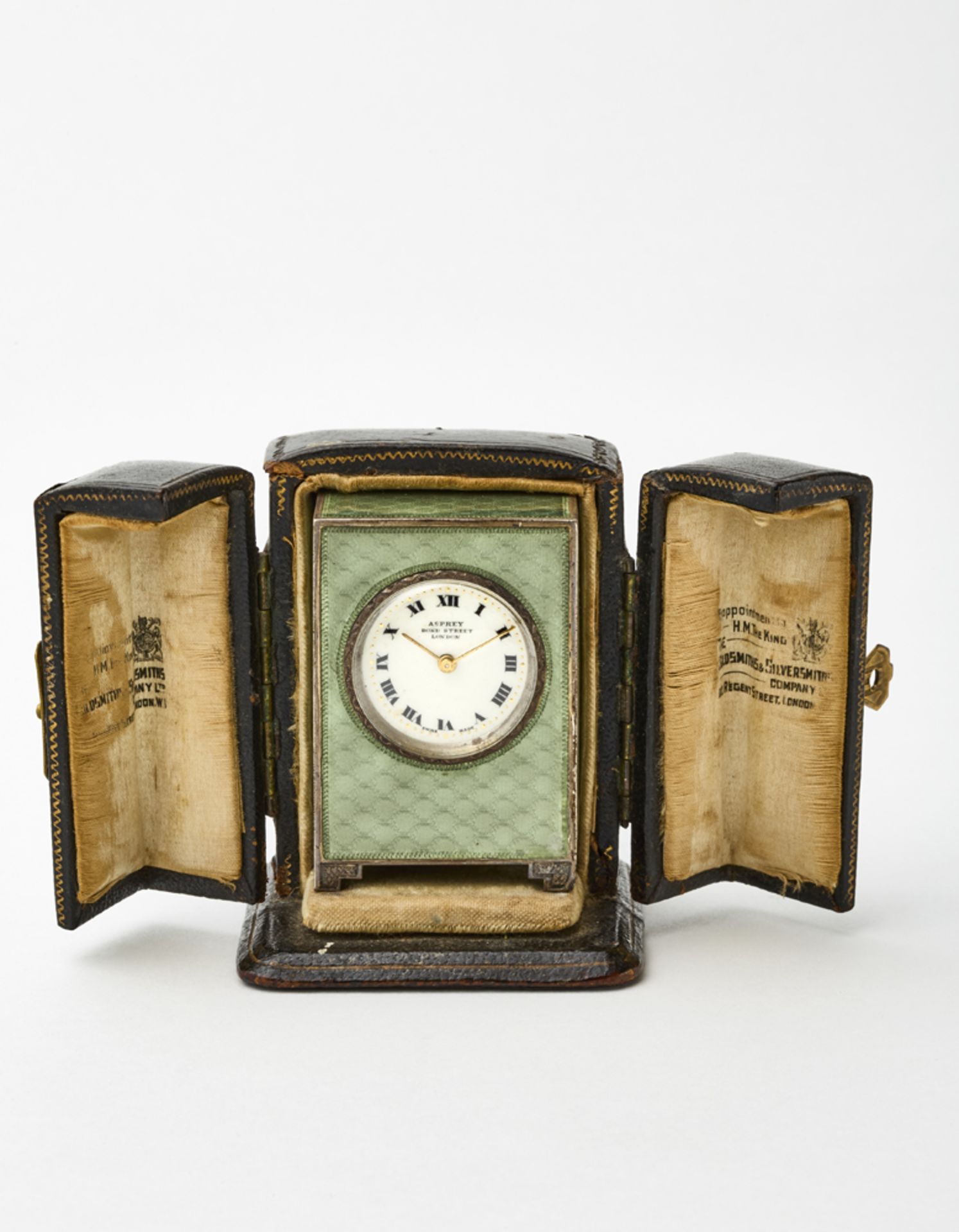 ASPREYSmall silver and guillochÃ© enamel table clock.White dial with Roman numerals signed "Asprey
