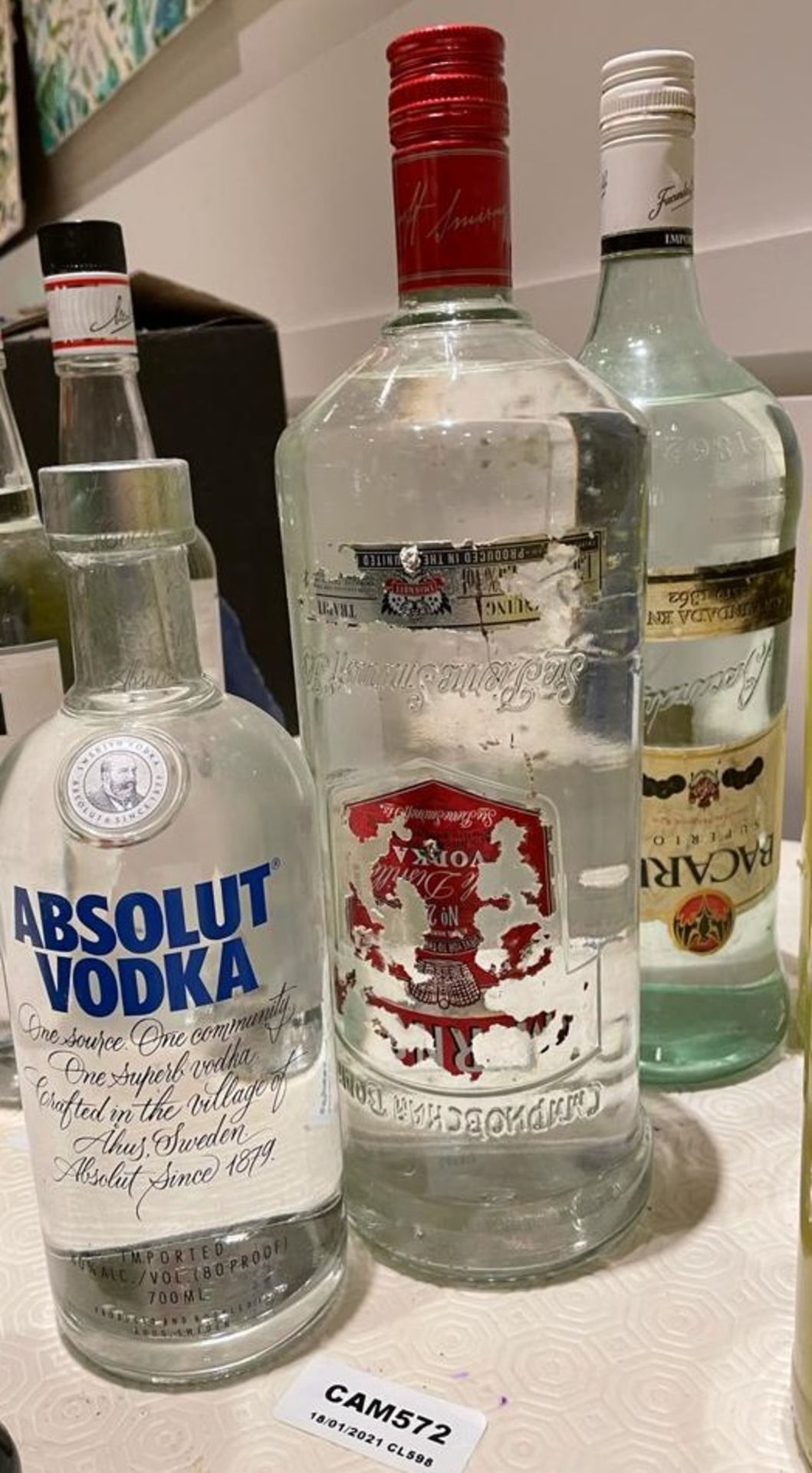 3 x Assorted Bottles Of Spirits - Lot Includes: 1 x BACARDI, 1 x ABSOLUTE VODKA, 1 x SMIRNOFF - Image 3 of 4