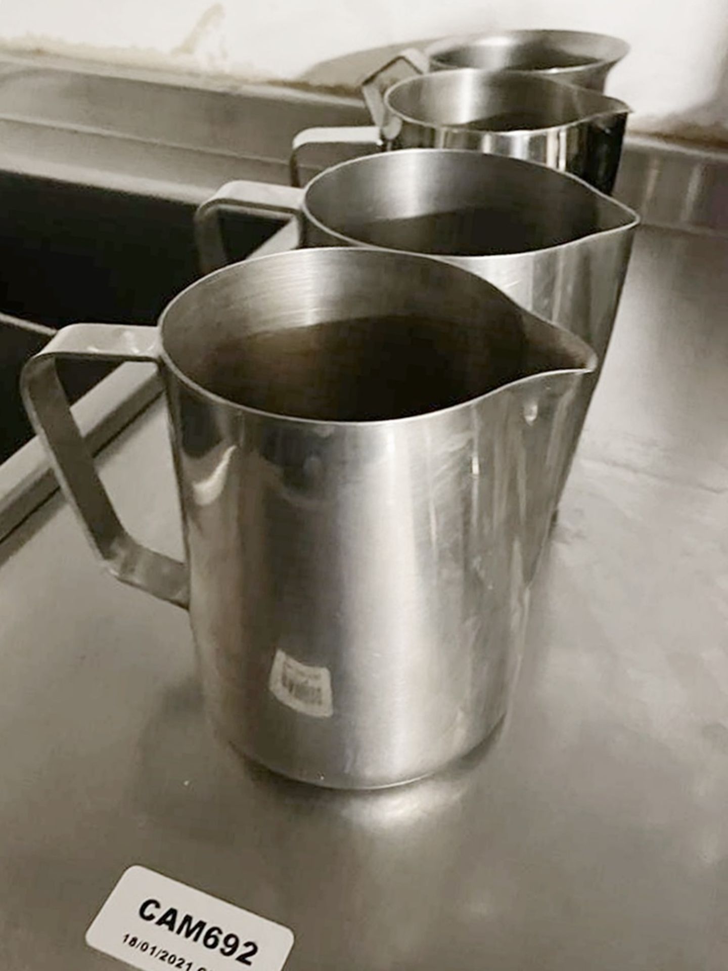 4 x Stainless Steel Restaurant Milk Jugs - Ref: CAM692 - CL612 - Location: London SW1PThis item is