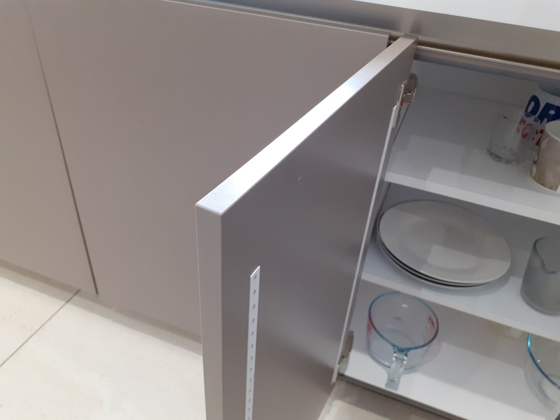 1 x SieMatic Handleless Fitted Kitchen With Intergrated NEFF Appliances, Corian Worktops And Island - Image 69 of 92