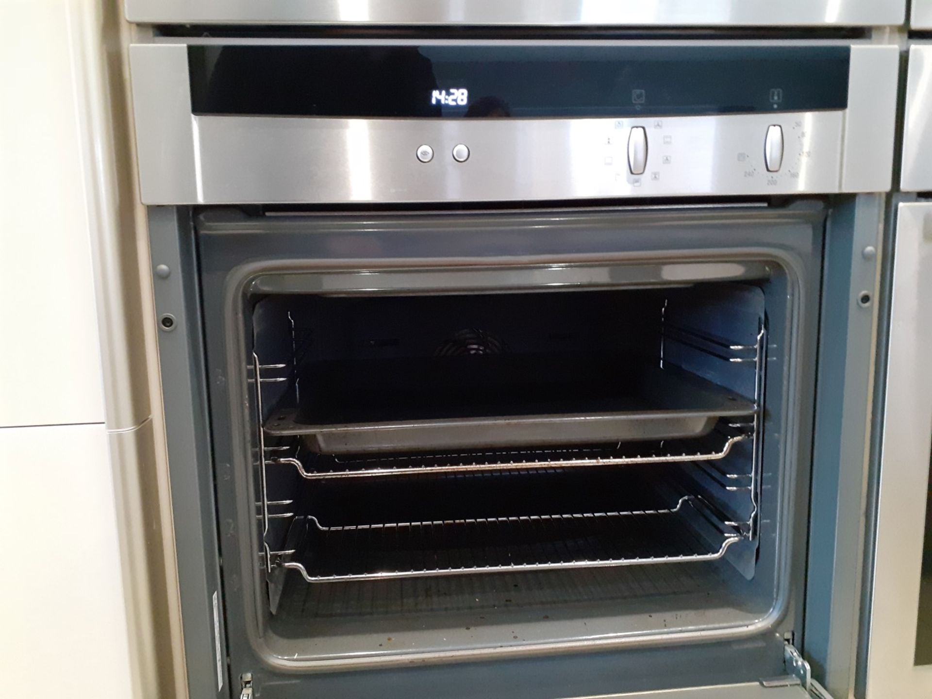 1 x SieMatic Handleless Fitted Kitchen With Intergrated NEFF Appliances, Corian Worktops And Island - Image 31 of 92