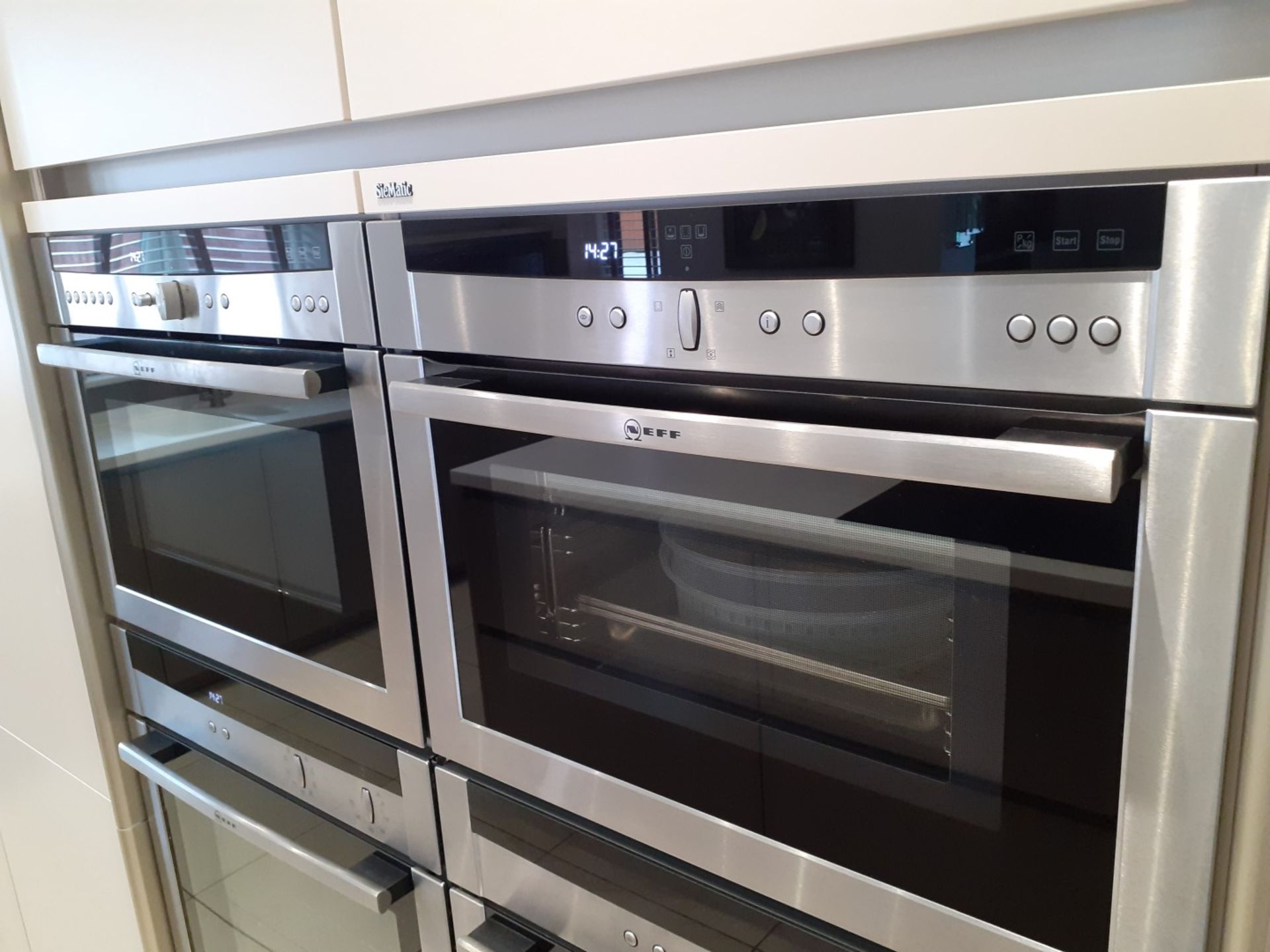 1 x SieMatic Handleless Fitted Kitchen With Intergrated NEFF Appliances, Corian Worktops And Island - Image 26 of 92