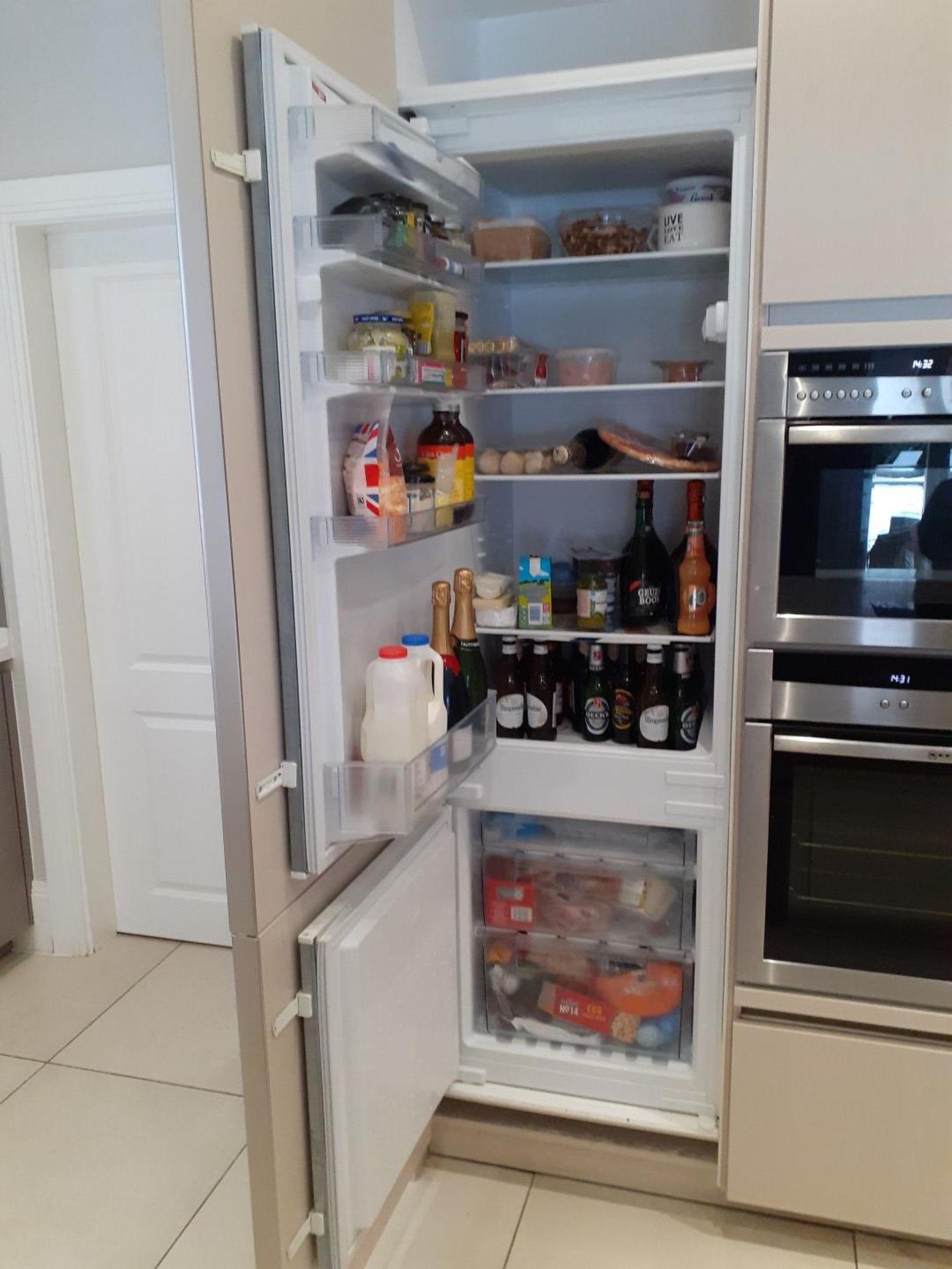 1 x SieMatic Handleless Fitted Kitchen With Intergrated NEFF Appliances, Corian Worktops And Island - Image 44 of 92