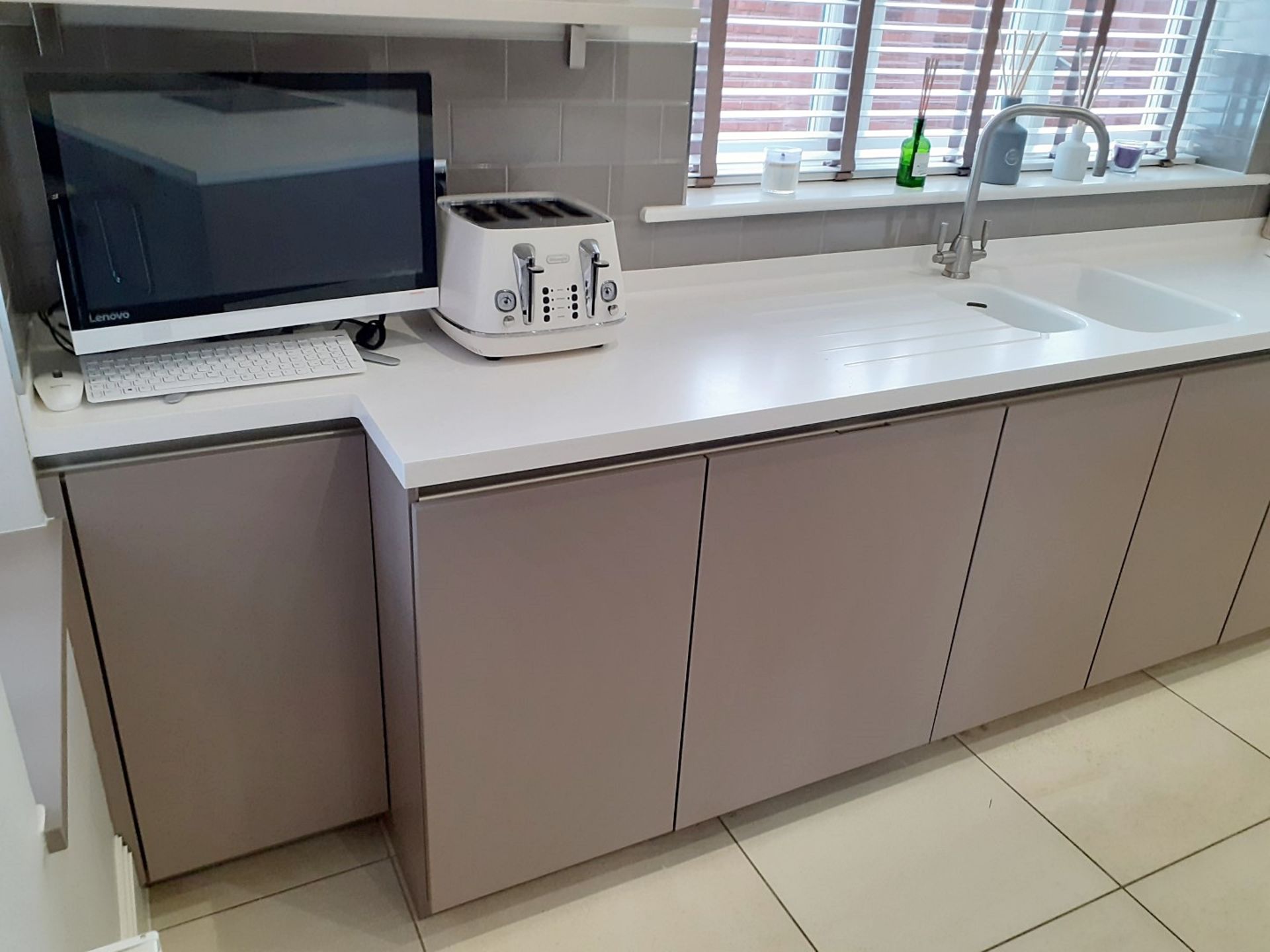 1 x SieMatic Handleless Fitted Kitchen With Intergrated NEFF Appliances, Corian Worktops And Island - Image 19 of 92