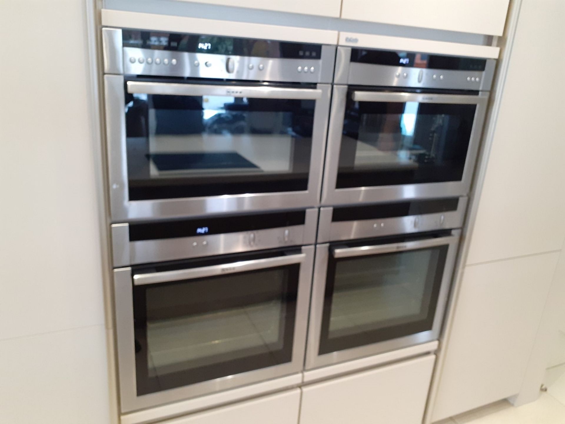 1 x SieMatic Handleless Fitted Kitchen With Intergrated NEFF Appliances, Corian Worktops And Island - Image 24 of 92