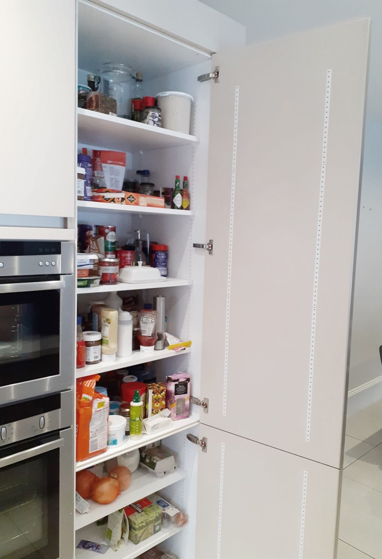 1 x SieMatic Handleless Fitted Kitchen With Intergrated NEFF Appliances, Corian Worktops And Island - Image 41 of 92