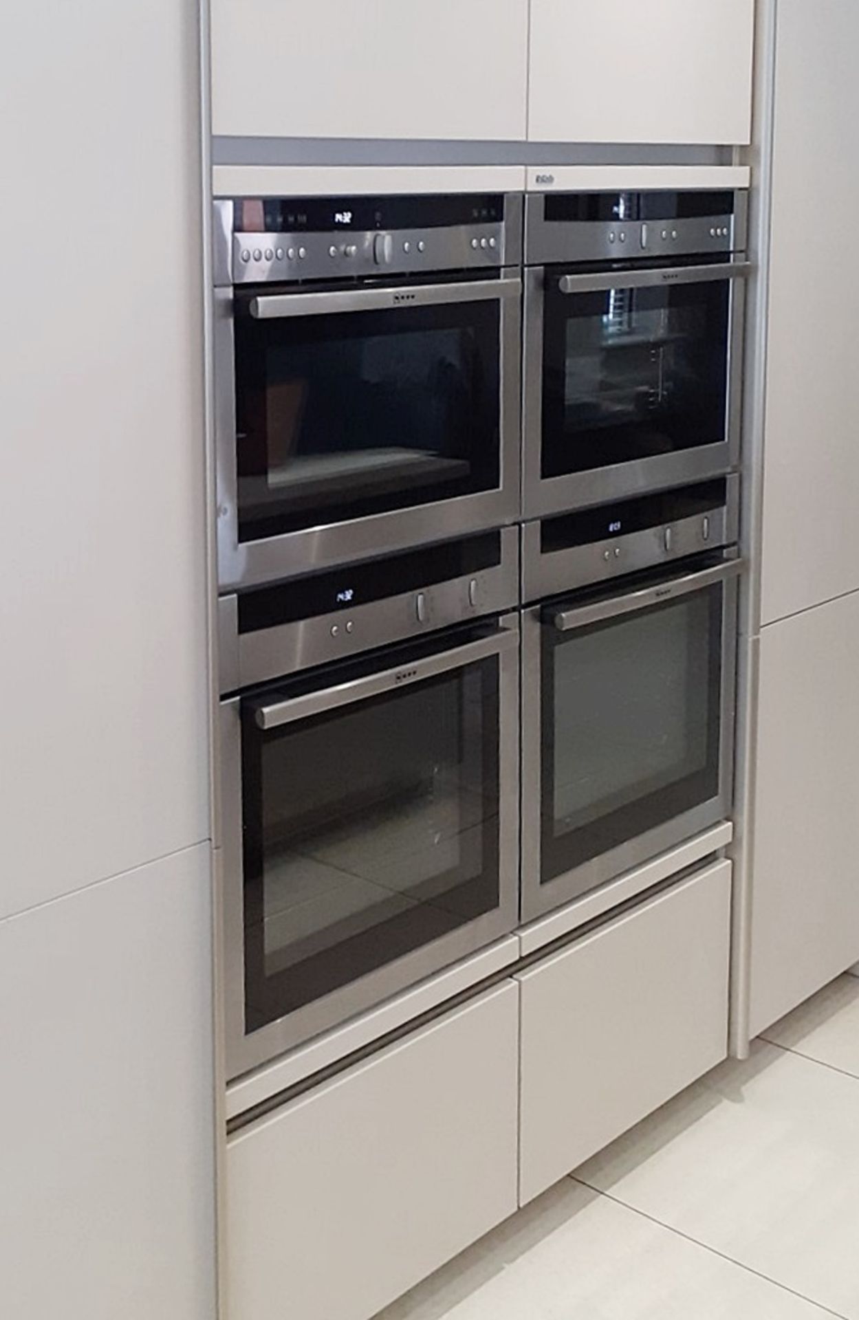 1 x SieMatic Handleless Fitted Kitchen With Intergrated NEFF Appliances, Corian Worktops And Island - Image 47 of 92