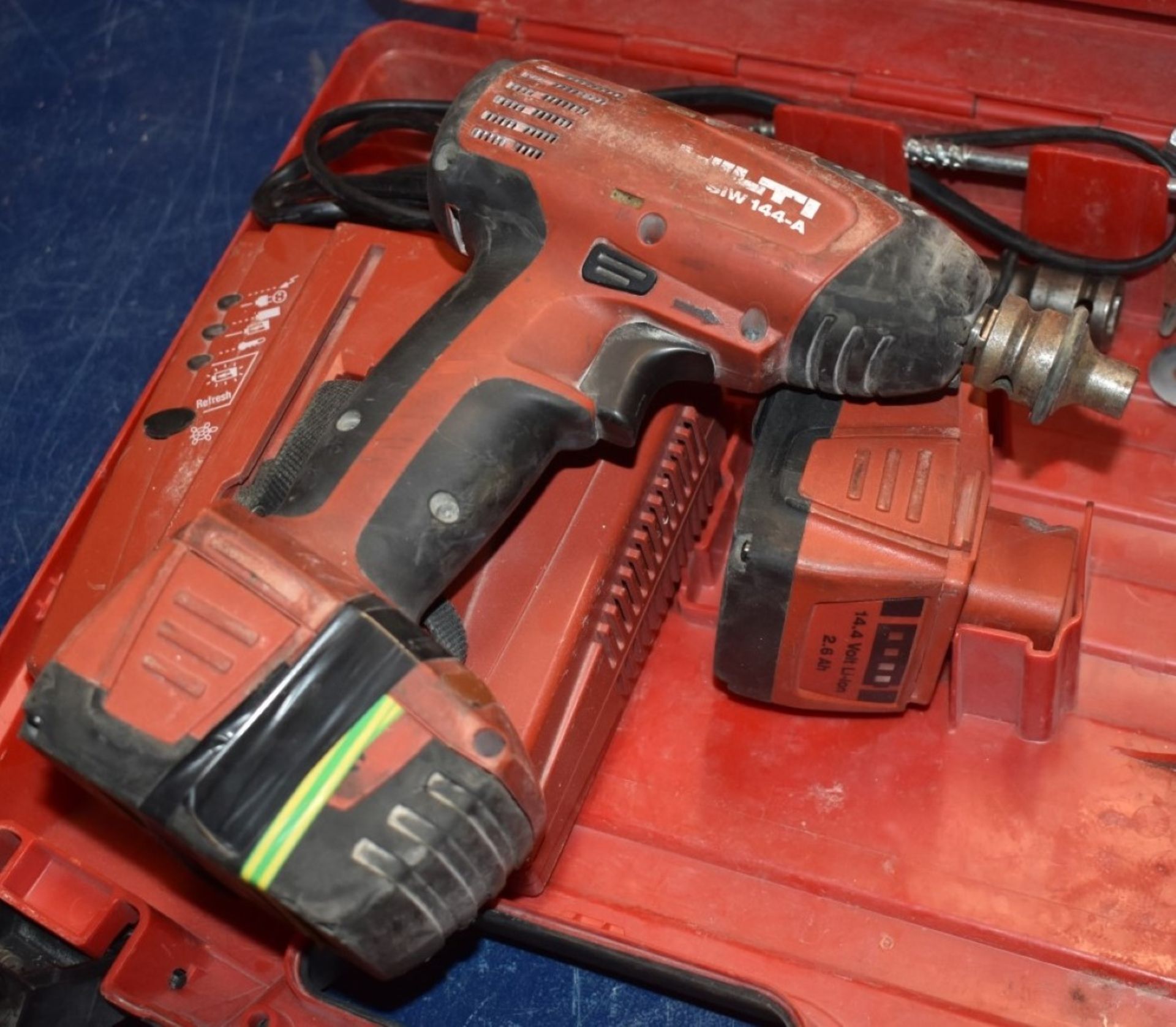 1 x Hilti SIW 144A Cordless Impact Wrench With Charger, Two Batteries and Carry Case - Image 3 of 5