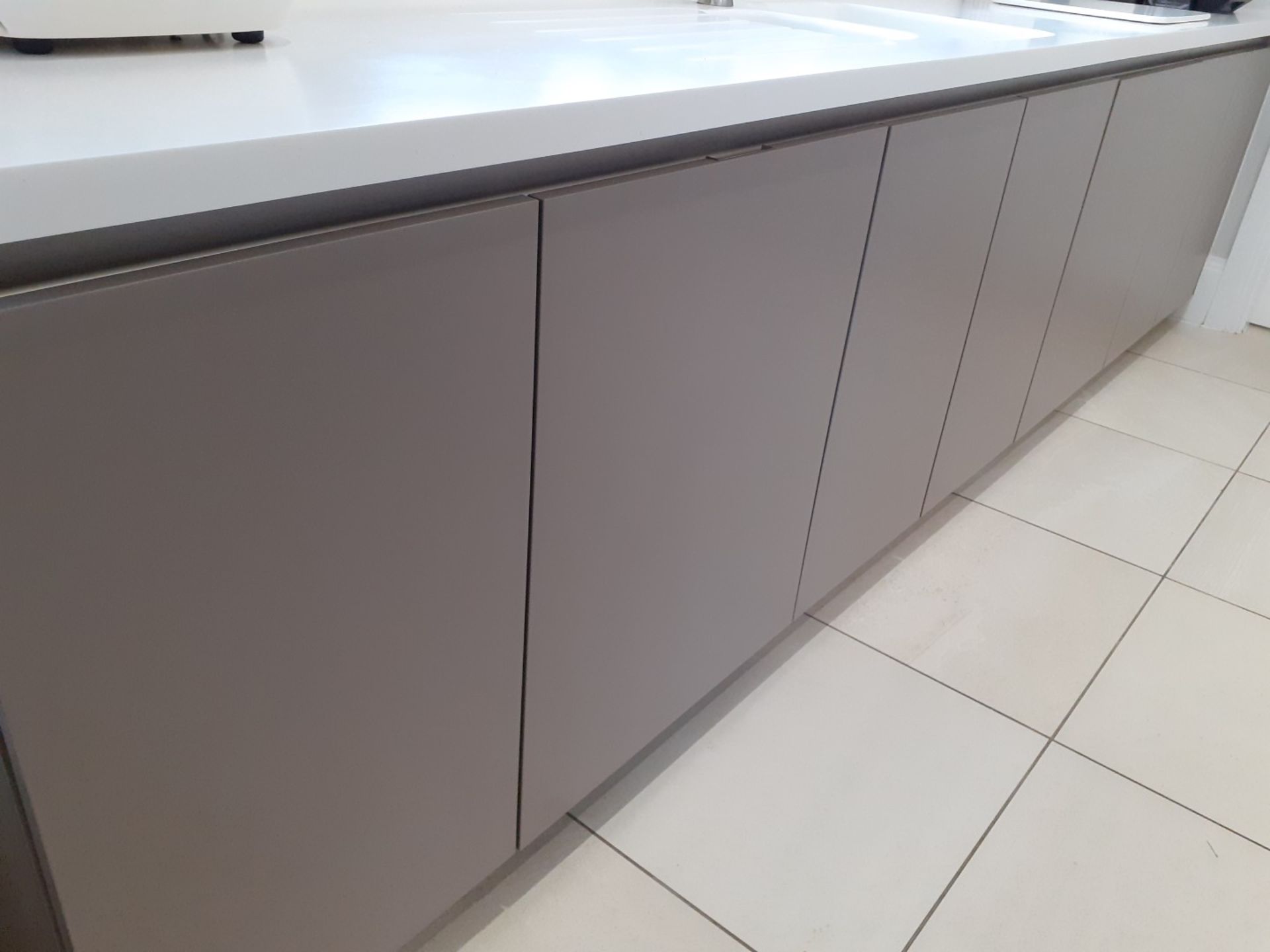 1 x SieMatic Handleless Fitted Kitchen With Intergrated NEFF Appliances, Corian Worktops And Island - Image 35 of 92