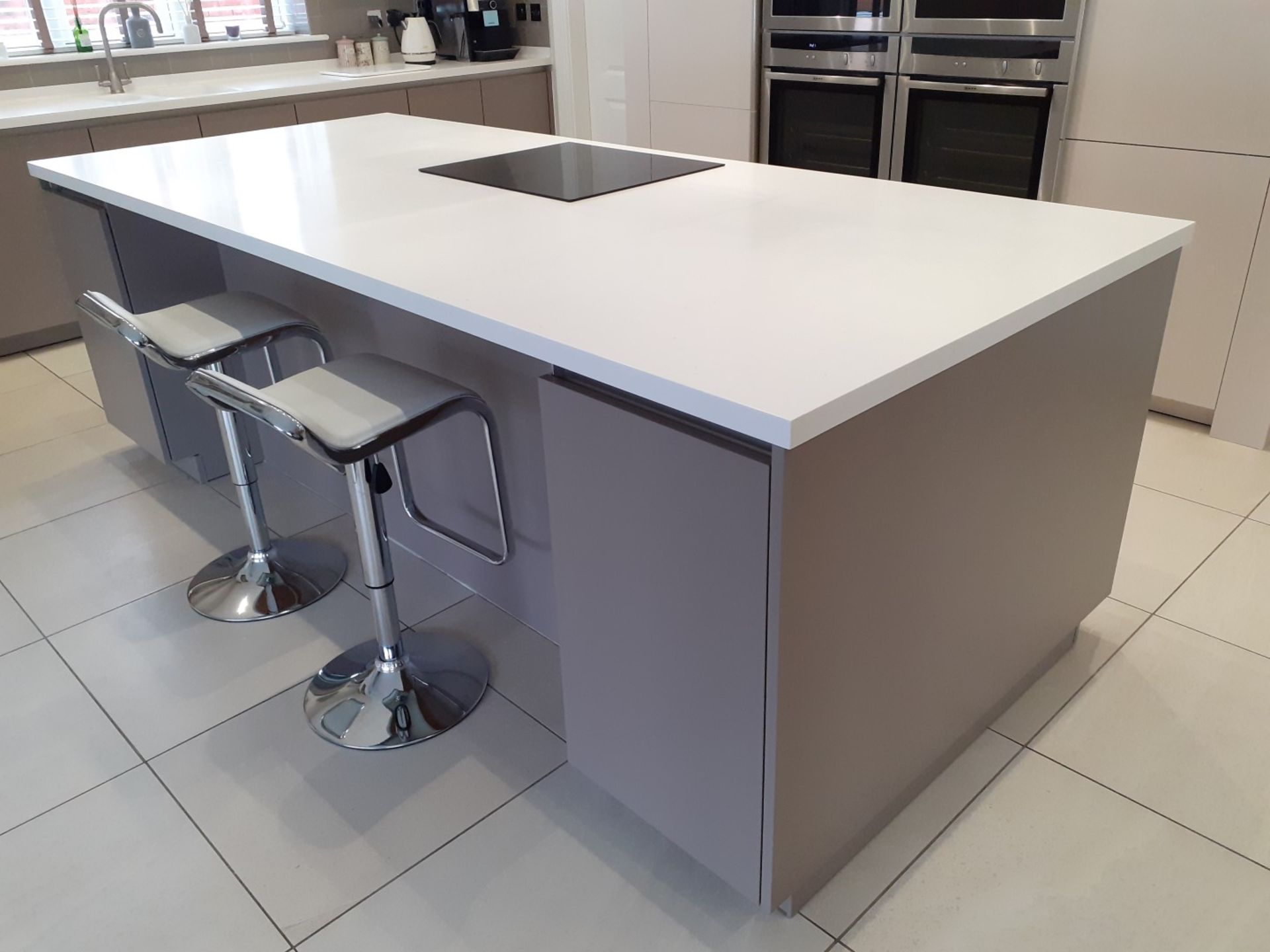 1 x SieMatic Handleless Fitted Kitchen With Intergrated NEFF Appliances, Corian Worktops And Island - Image 44 of 92