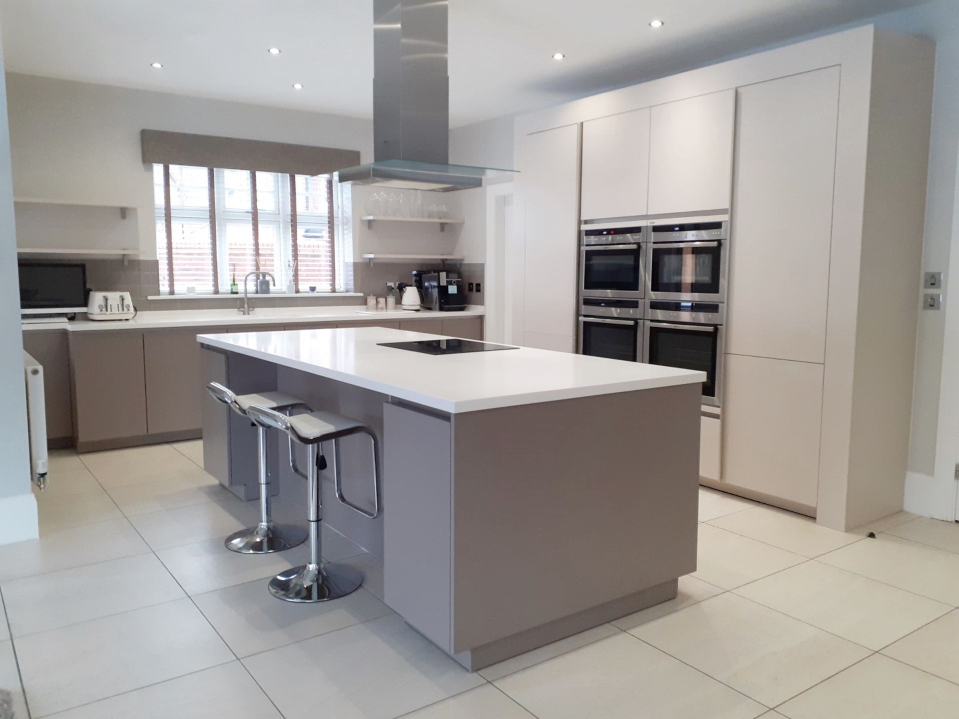 1 x SieMatic Handleless Fitted Kitchen With Intergrated NEFF Appliances, Corian Worktops And Island