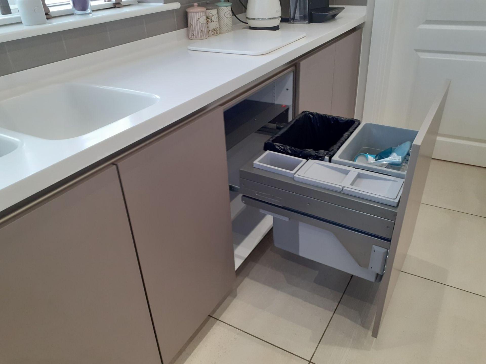 1 x SieMatic Handleless Fitted Kitchen With Intergrated NEFF Appliances, Corian Worktops And Island - Image 23 of 92