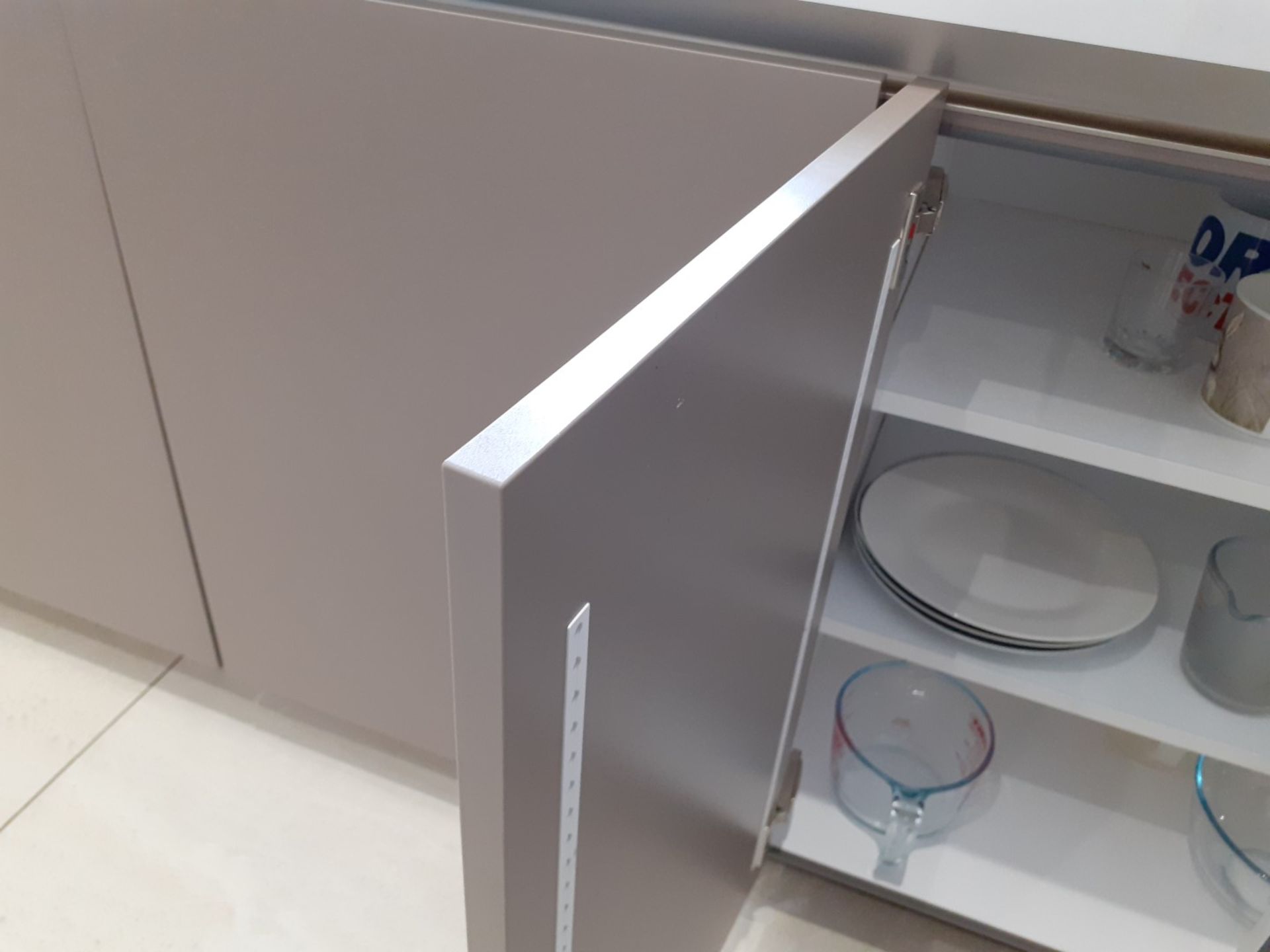 1 x SieMatic Handleless Fitted Kitchen With Intergrated NEFF Appliances, Corian Worktops And Island - Image 46 of 92