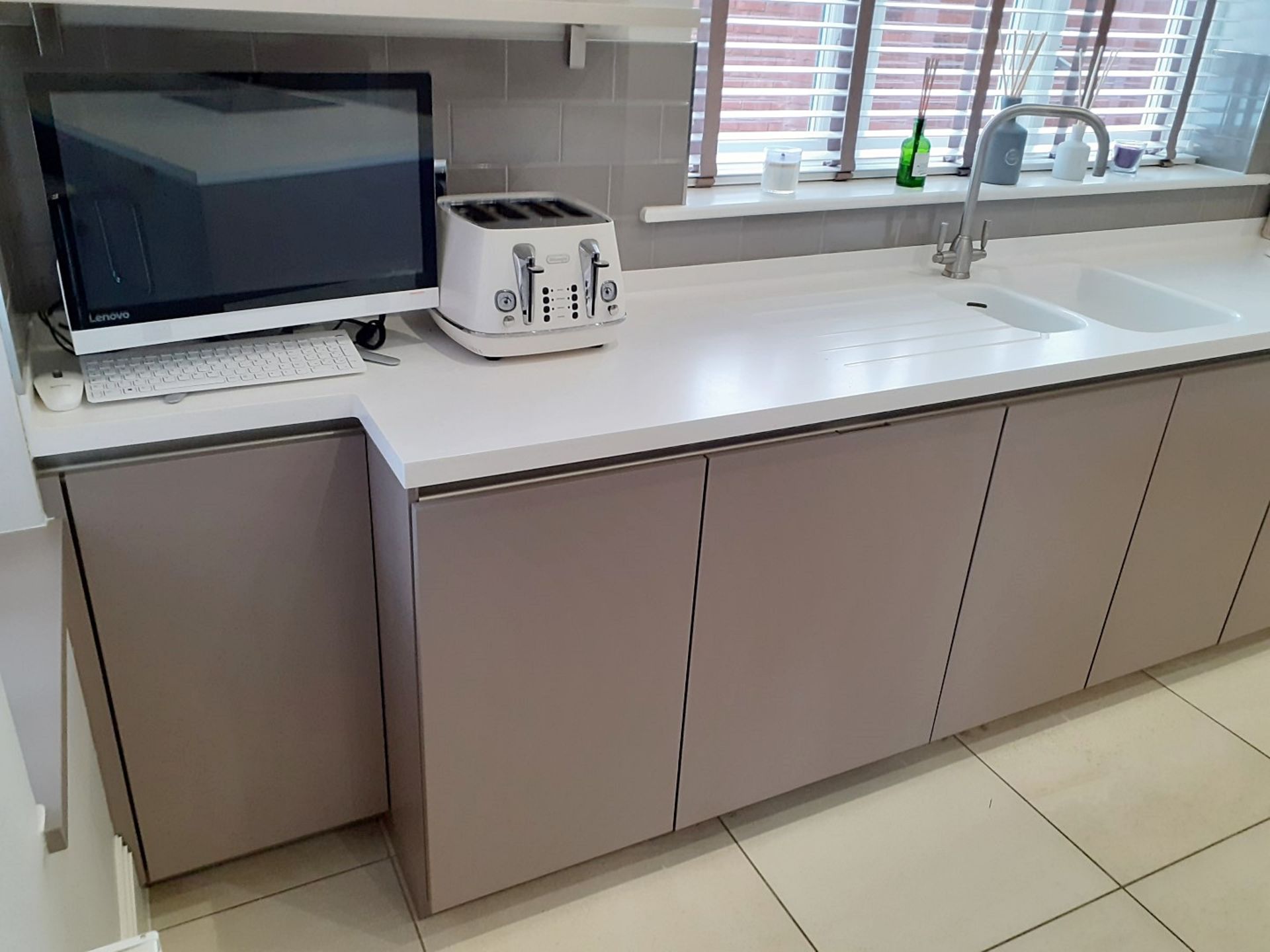 1 x SieMatic Handleless Fitted Kitchen With Intergrated NEFF Appliances, Corian Worktops And Island - Image 24 of 92