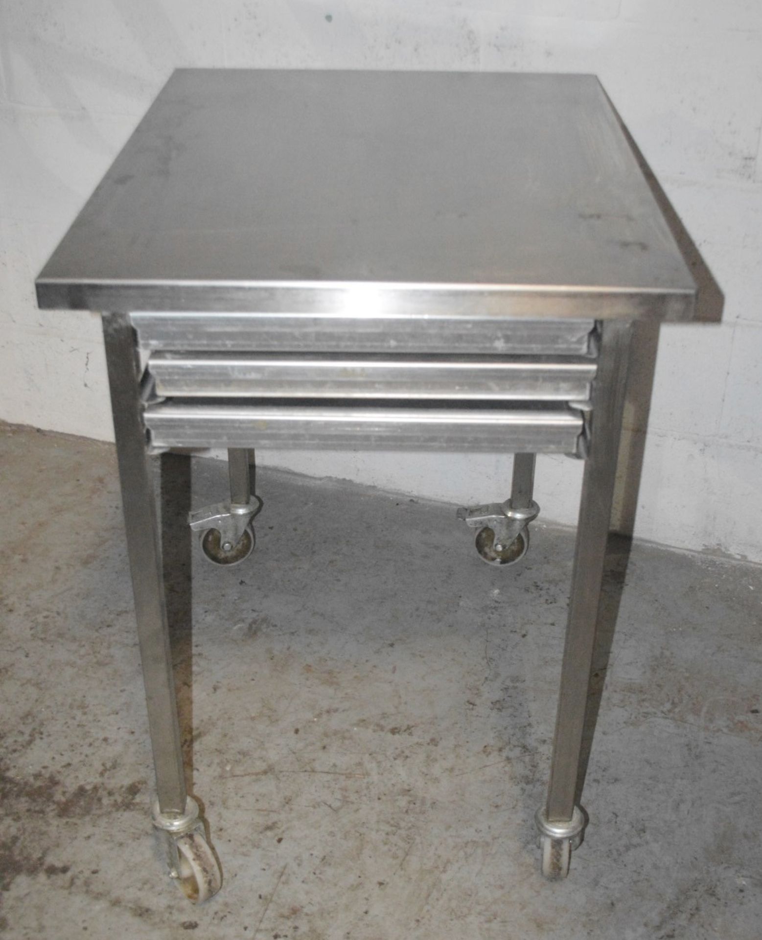 1 x Stainless Steel Commercial Kitchen 3-Drawer Prep Counter On Castors - Dimensions: H87 x W84 x