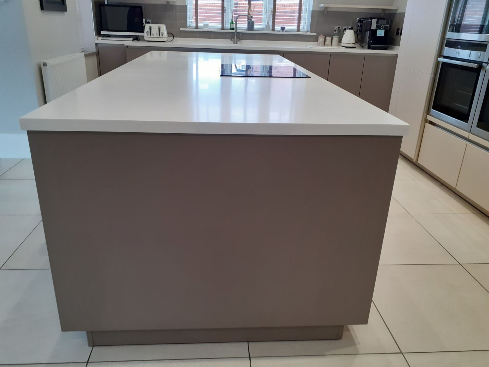 1 x SieMatic Handleless Fitted Kitchen With Intergrated NEFF Appliances, Corian Worktops And Island - Image 60 of 92