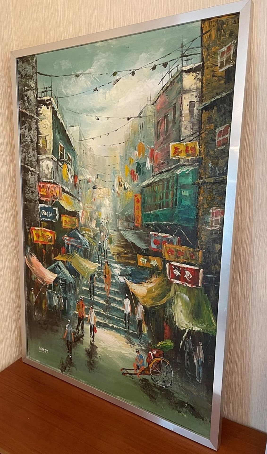 1 x Picture Depicting An Oriental Street Scene - Signed WEST - Dimensions: 65.5 x 96.5cm - Image 2 of 3