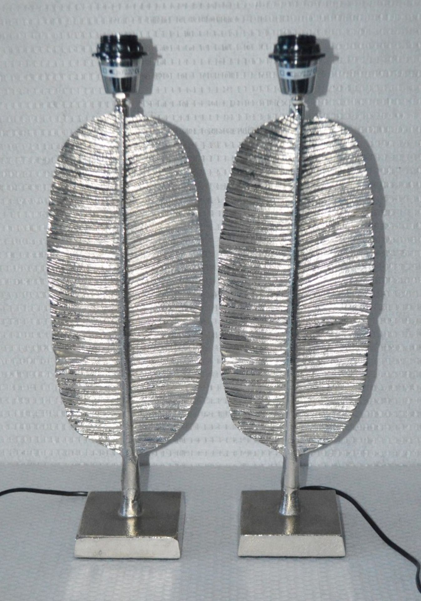 A Pair Of “Feather” Metal Bedside Lamps In A Silver Finish - From An Exclusive Property In Hale