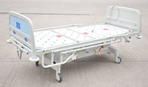1 x Huntleigh CONTOURA Electric Hospital Bed - Features Rise/Fall 3-Way Profiling, Side Rails,