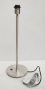 A Pair Of CHELSOM Candle Stick Table Lamps In A Brushed Silver Finish - Unused Boxed Stock -