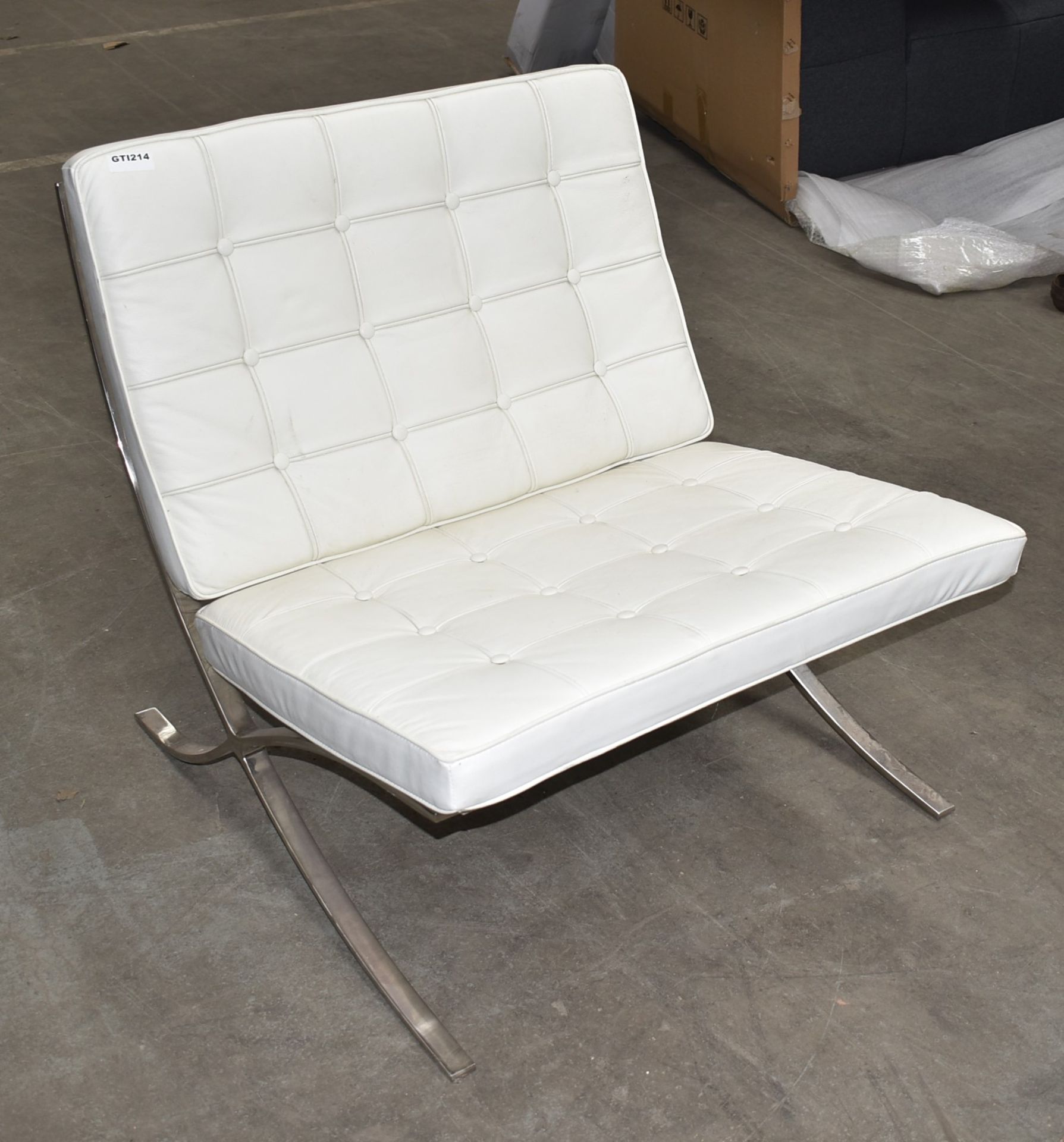 1 x Contemporary Lounge Chair With Strap Supports, Chrome Base and White Leather Studded Seat and