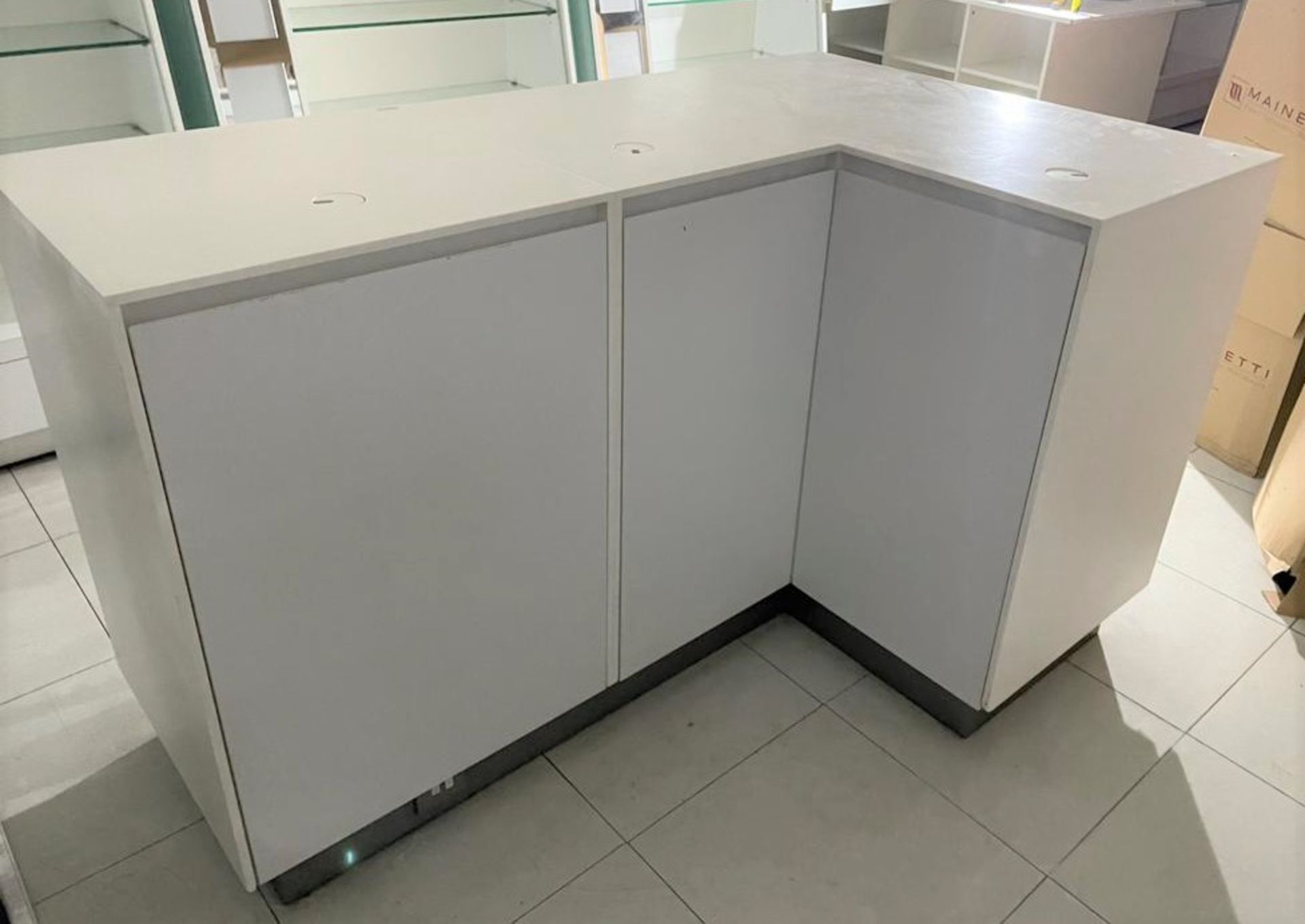 1 x L Shape Retail Counter in White With Advertising Light Boxes and Storage Cabinets With Cable - Image 17 of 19