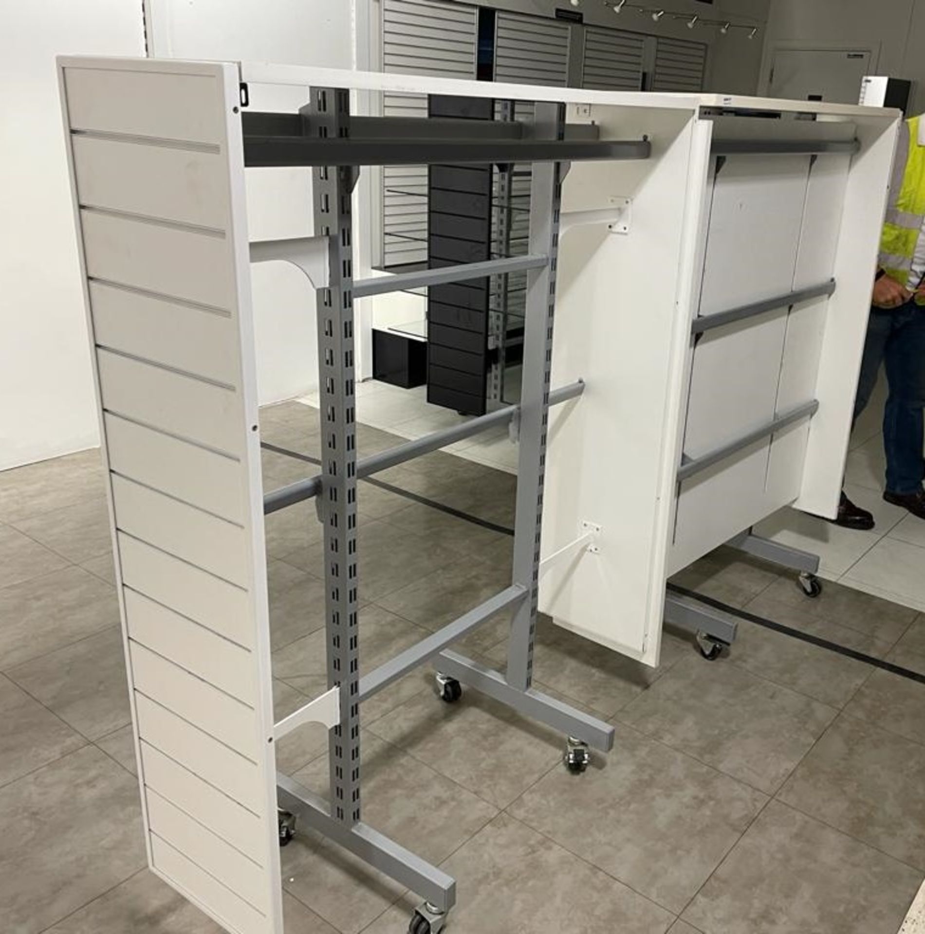 2 x Retail Display Units in White Featuring Clothes Rails, Slat Walls and Castor Wheels - Size - Image 4 of 5