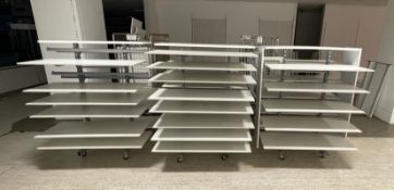 3 x Retail Mobile Display Units in White Featuring Multiple Adjustable Shelves on Both Sides -